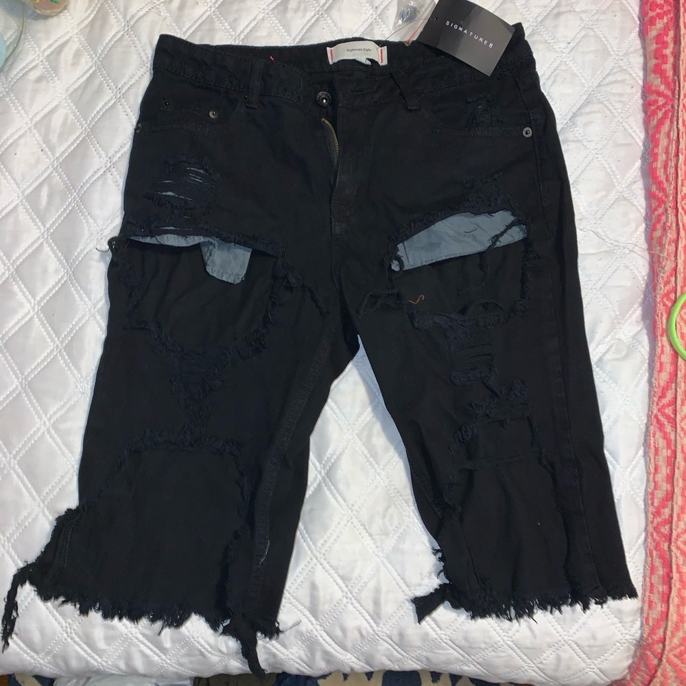 Black ripped knee shorts